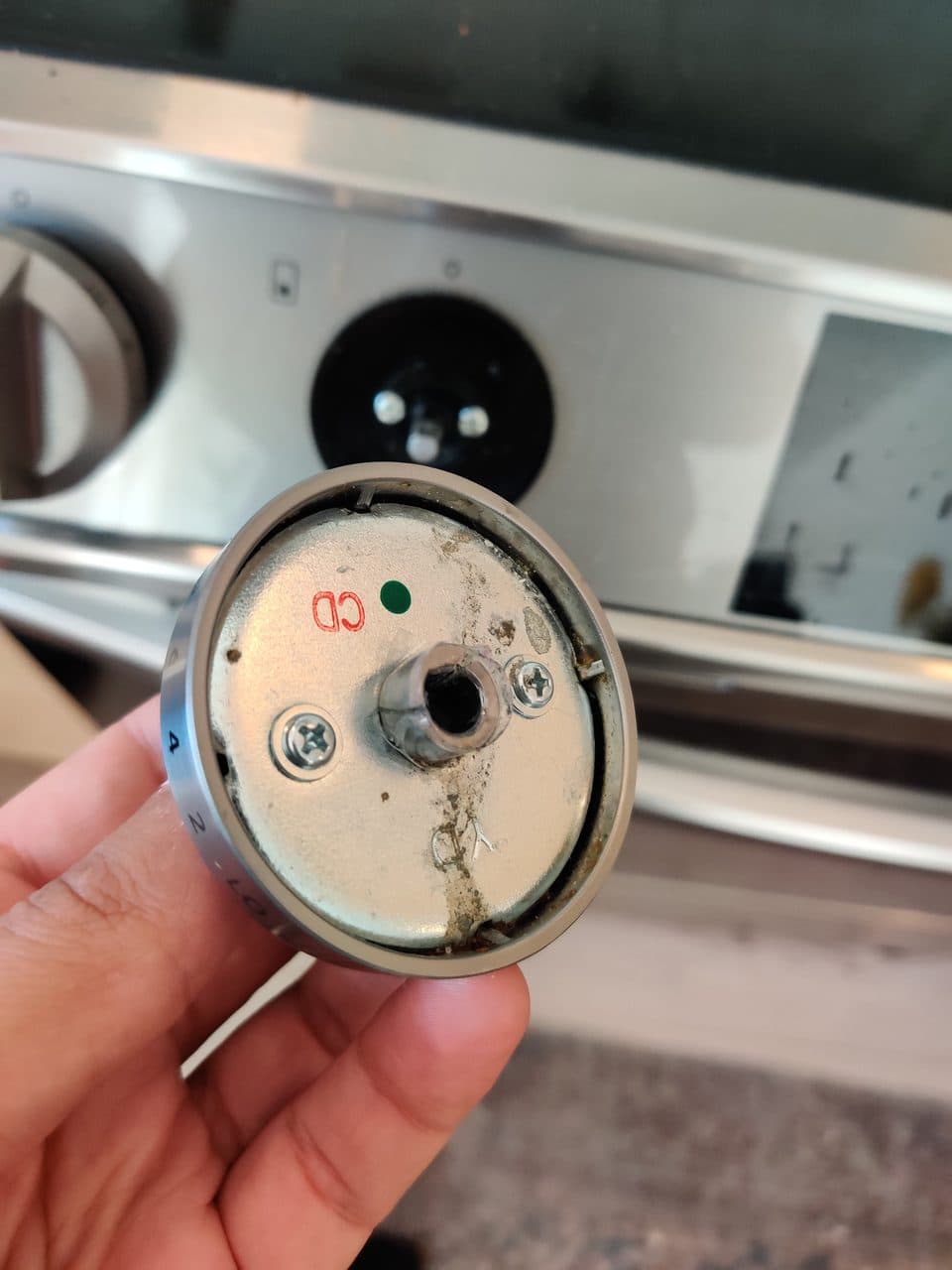 Worn range control knob: Samsung range, model NE63T8511SS (oven & stove repair in Doral, FL, August 2026)