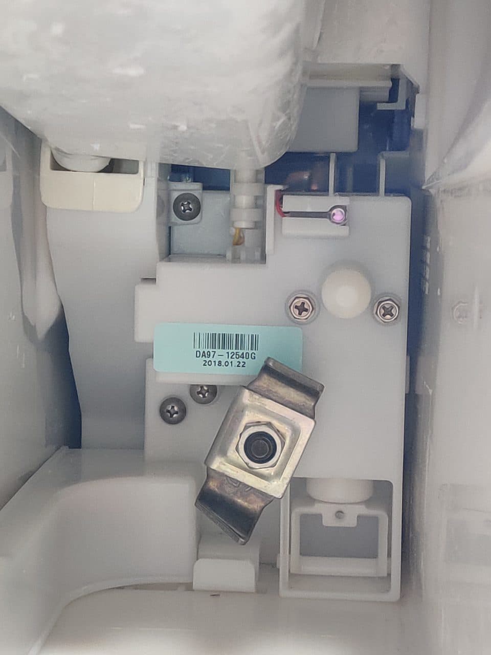 Ice maker compartment with the bucket out: Samsung refrigerator, model RF263BEAESR (refrigerator repair in Hialeah, FL, September 2026)