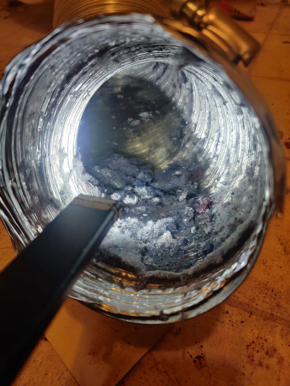 Lint built up inside a dryer vent duct